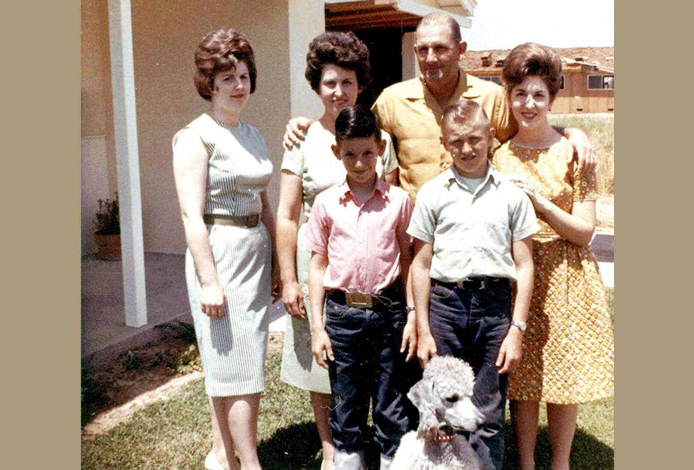 Family photo of Gertrude and Robert with their kids JoAnn, Susan, Fred, Jim and their dog Gigi