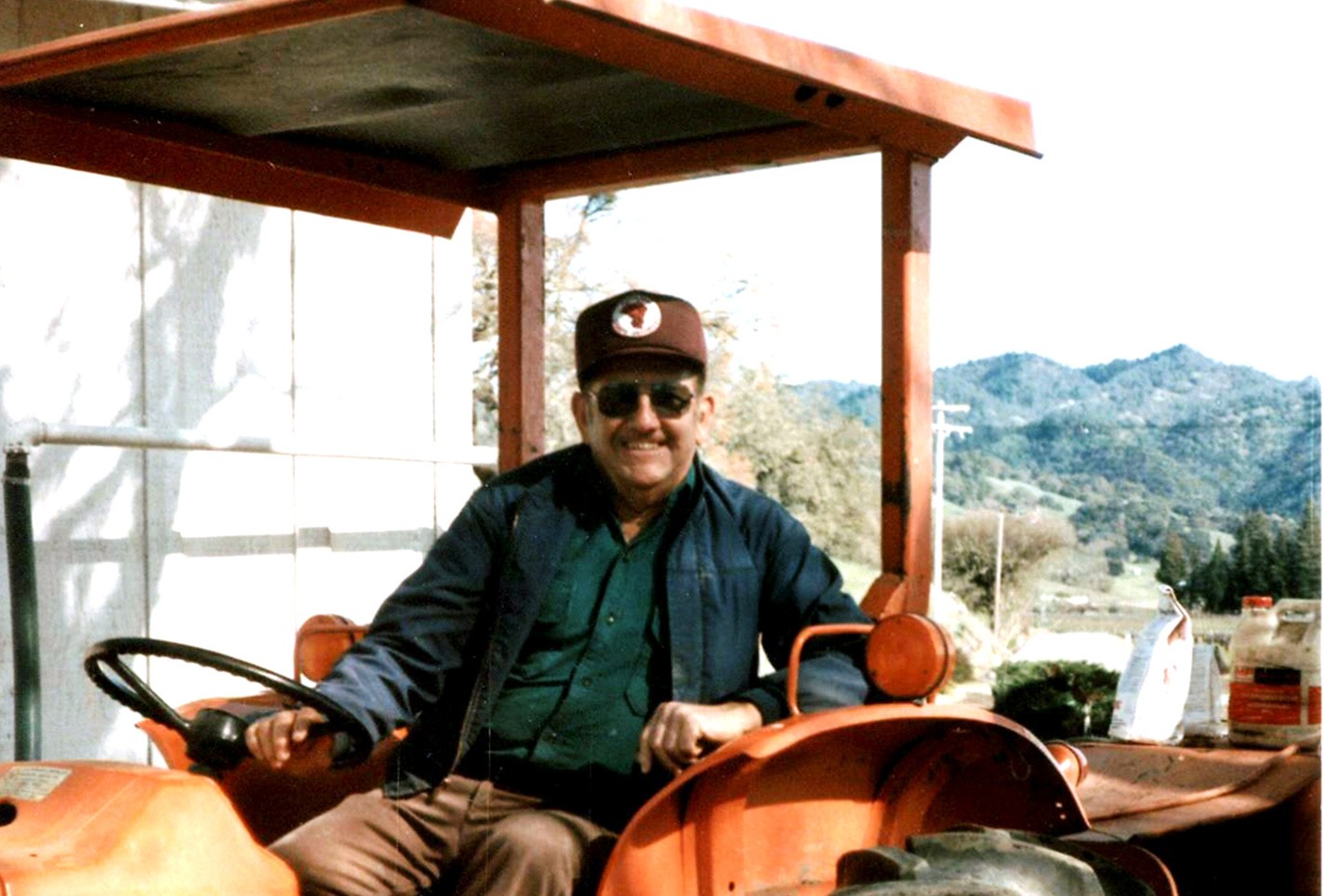 Robert sitting on a tractor in 1963